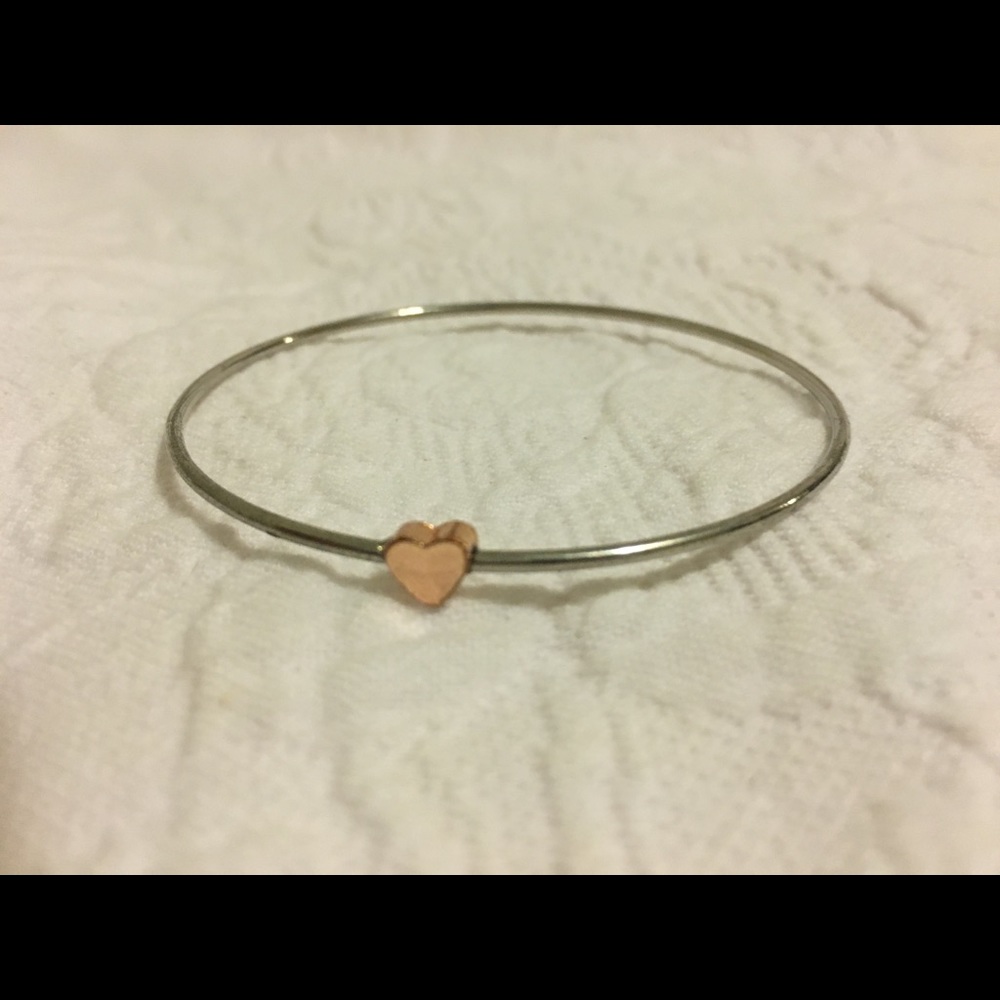 NWOT silver metal bangle with rose gold heart